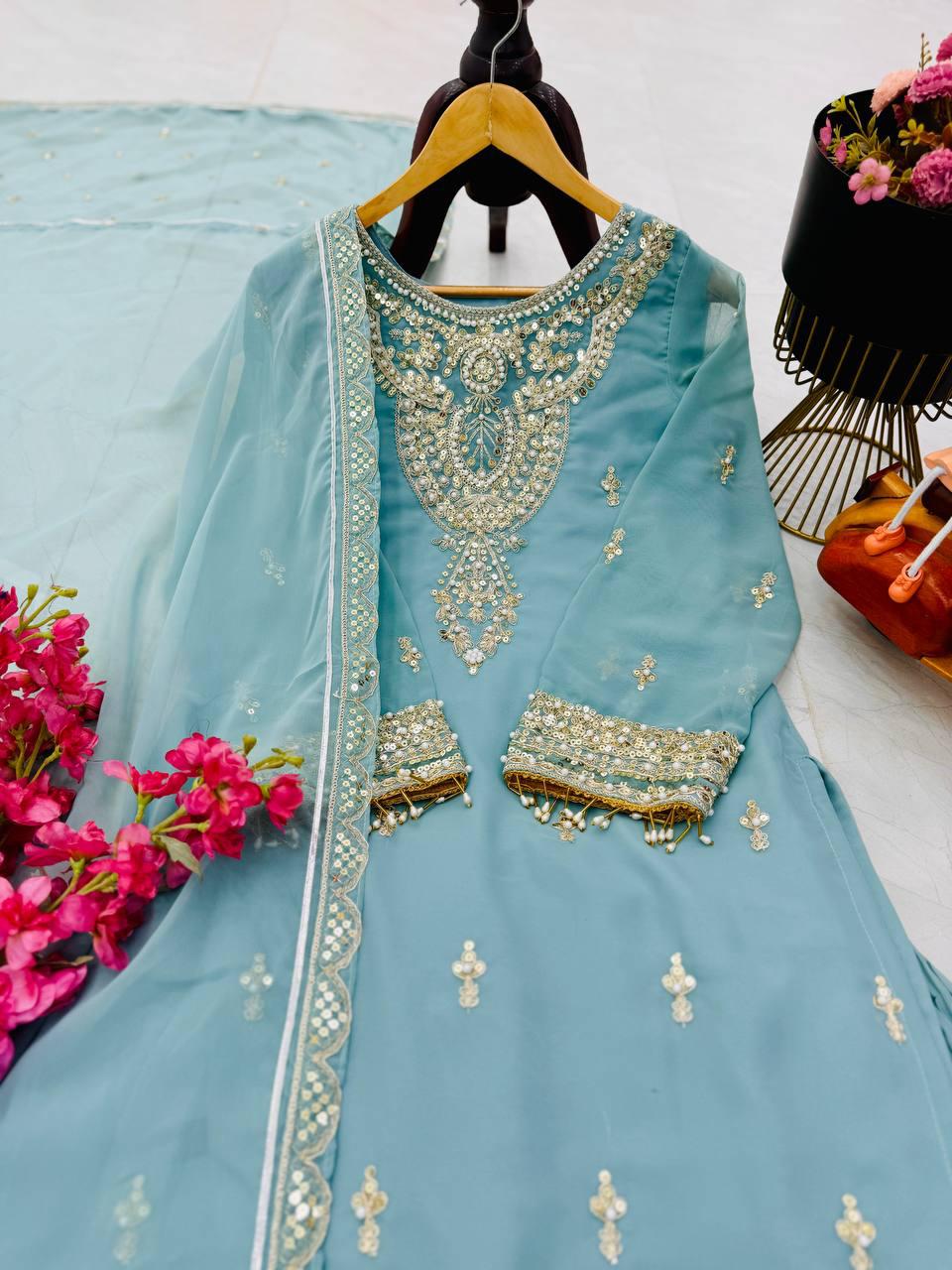 Turn heads this festive season with our New Designer Party Wear Set, featuring elegant embroidery and luxurious fabric
