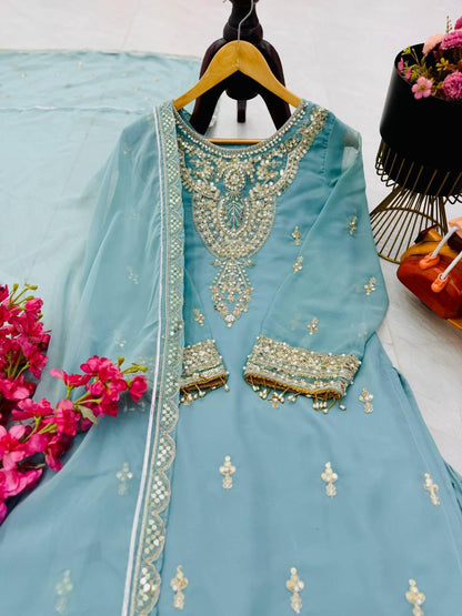 Turn heads this festive season with our New Designer Party Wear Set, featuring elegant embroidery and luxurious fabric