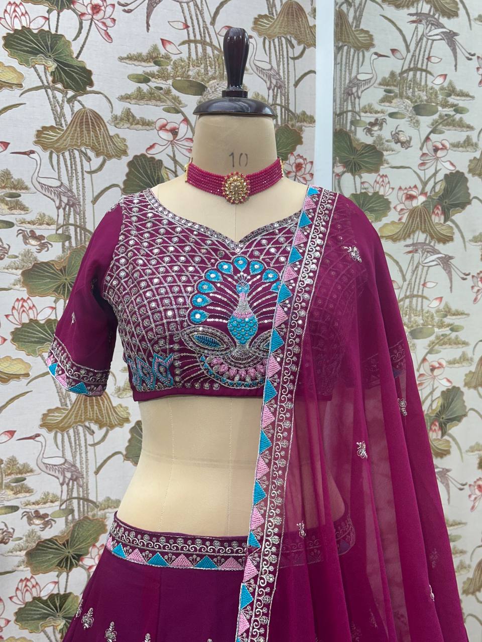 Embroidered Faux Georgette Lehenga Set with Net Dupatta